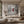 Red Dress Paris Wall Art displayed above a sofa in a neutral interior | Oildeco