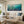 Azure Shoal Ocean Wall Art displayed above a sofa in a neutral interior | Oildeco