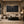 Black Layers Textured Wall Art displayed in a bright dining room | Oildeco