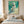 Sun Hat Shore Figure Wall Art styled above a serene coastal bedroom | OILDECO
