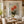 Coral Blossom Floral Wall Art in a warm dining room setting | OILDECO
