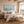 White Sails Ocean Wall Art displayed above a sofa in a neutral interior | Oildeco