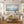 White Sails Ocean Wall Art shown in a calm bedroom setting | Oildeco