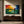 Sunset Pier Ocean Wall Art displayed above a sofa in a neutral interior | Oildeco