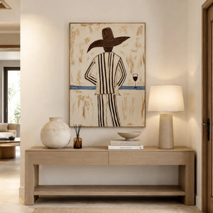 Sun Hat Figure Wall Art styled in a contemporary entryway | Oildeco