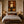 Desert Muse Figure Wall Art shown in a calm bedroom setting | Oildeco