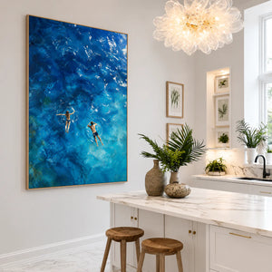 Two Swimmers in Deep Blue Water Wall Art styled interior scene 1 | OILDECO