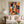 Colorful Seated Figure with a Golden Dog Wall Art styled interior scene 3 | OILDECO