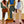 Three Hat-Wearing Figures in Colorful Checks Wall Art artwork view | OILDECO