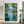 Turquoise Pond beneath Green Trees Wall Art styled interior scene 1 | OILDECO