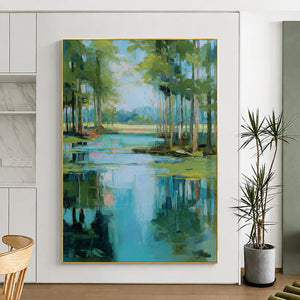 Turquoise Pond beneath Green Trees Wall Art styled interior scene 1 | OILDECO