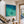 Two Swimmers in Sunlit Turquoise Water Wall Art styled interior scene 1 | OILDECO