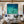 Two Swimmers in Sunlit Turquoise Water Wall Art styled interior scene 4 | OILDECO