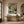 Sage Leaf Abstract Wall Art displayed above a sofa in a neutral interior | Oildeco
