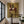 Tall Chestnut Horse and Dark-Clad Rider Wall Art styled interior scene 2 | OILDECO