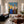 Two Waving Figures in Blue and Yellow Wall Art styled interior scene 1 | OILDECO