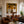 Two Hat Figures Under Palms on Ochre Wall Art styled interior scene 2 | OILDECO