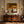 Two Hat Figures Under Palms on Ochre Wall Art styled interior scene 4 | OILDECO