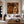 Striped Figure Beneath a Palm on Warm Brown Wall Art styled interior scene 3 | OILDECO