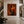 Orange Book Reader with a Cup and Checked Trousers Wall Art styled interior scene 1 | OILDECO