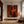 Orange Book Reader with a Cup and Checked Trousers Wall Art styled interior scene 3 | OILDECO