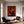 Orange Book Reader with a Cup and Checked Trousers Wall Art styled interior scene 4 | OILDECO