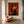 Orange Book Reader with a Cup and Checked Trousers Wall Art styled interior scene 5 | OILDECO