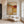 Ochre and Burgundy Layers Through a Cream Field Wall Art styled interior scene 1 | OILDECO