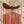 Wide Brown Hat Above Red and Cream Stripes Wall Art artwork view | OILDECO