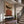 Wide Brown Hat Above Red and Cream Stripes Wall Art styled interior scene 4 | OILDECO