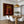 Pink-Hatted Trio in Mustard Tops and Red Trousers Wall Art styled interior scene 3 | OILDECO