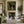 Cream-Clad Figure with a Black Horse on Olive Wall Art styled interior scene 3 | OILDECO