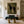 Cream-Clad Figure with a Black Horse on Olive Wall Art styled interior scene 4 | OILDECO