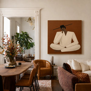 Quiet Cross-Legged Figure in Cream on Burnt Ochre Wall Art styled interior scene 3 | OILDECO