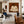 Quiet Cross-Legged Figure in Cream on Burnt Ochre Wall Art styled interior scene 4 | OILDECO
