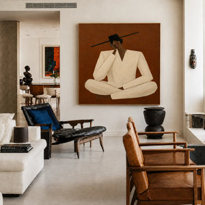 Quiet Cross-Legged Figure in Cream on Burnt Ochre Wall Art styled interior scene 4 | OILDECO