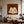 Quiet Cross-Legged Figure in Cream on Burnt Ochre Wall Art styled interior scene 5 | OILDECO