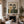 Seated Companions in Ochre and Green Stripes Wall Art styled interior scene 4 | OILDECO