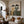 Seated Companions in Ochre and Green Stripes Wall Art styled interior scene 5 | OILDECO