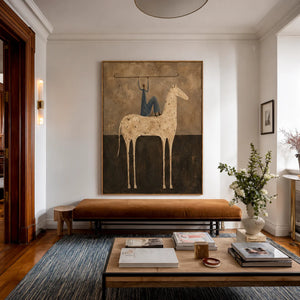 Blue Rider Balancing a Line Above a Cream Horse Wall Art styled interior scene 1 | OILDECO