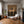 Blue Rider Balancing a Line Above a Cream Horse Wall Art styled interior scene 4 | OILDECO