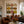 Nine Hat Figures in a Grid of Warm Stripes Wall Art styled interior scene 1 | OILDECO