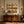 Nine Hat Figures in a Grid of Warm Stripes Wall Art styled interior scene 2 | OILDECO