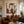 Striped Companions with Straw Hats Beneath Broad Leaves Wall Art styled interior scene 1 | OILDECO