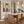 Striped Companions with Straw Hats Beneath Broad Leaves Wall Art styled interior scene 3 | OILDECO