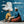 White City Dreamer and Seated Figure on Teal Wall Art artwork view | OILDECO