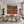 Terracotta Tennis Court above a Blue Bay Wall Art styled interior scene 1 | OILDECO