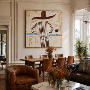 Striped Figure with a Sweeping Hat and Goblet Wall Art styled interior scene 1 | OILDECO