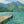 Swimmers by a Jetty on a Mountain Lake Wall Art artwork view | OILDECO