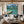 Swimmers by a Jetty on a Mountain Lake Wall Art styled interior scene 2 | OILDECO